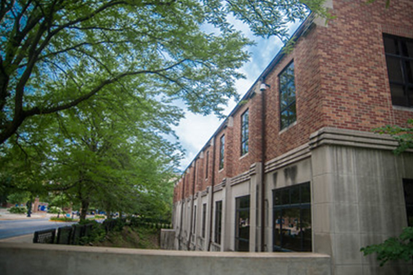 Registrar menu item view of Parson's Hall from the sidewalk. 