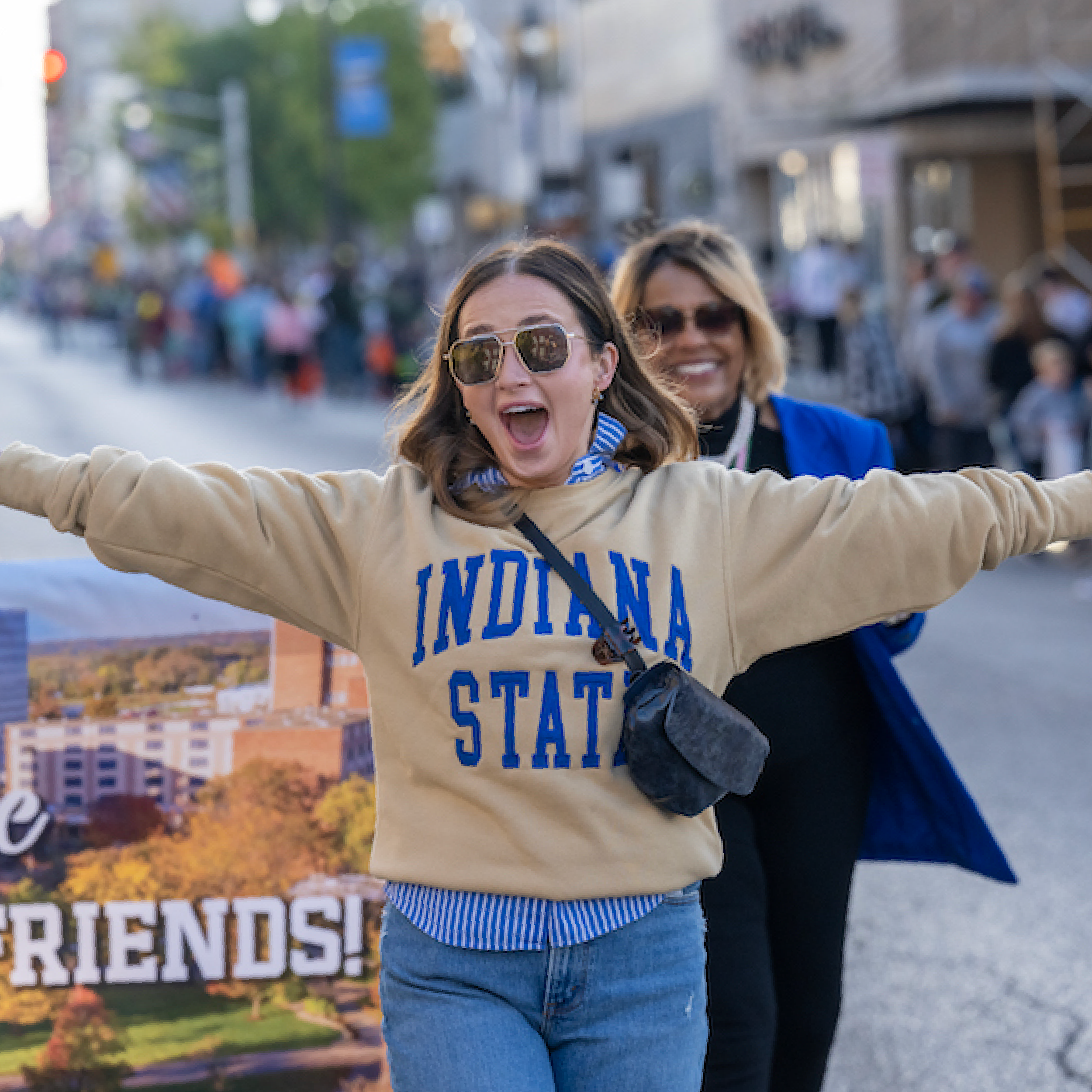 Alumni Board Member walking in the homecoming parade