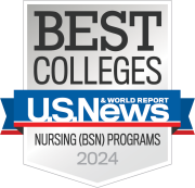 Logo of U.S. News & World Report featuring the text 'BEST COLLEGES', 'USN&WR', and 'Nursing (BSN) Programs 2024' on a badge with a gray and white color scheme and blue and red ribbons.