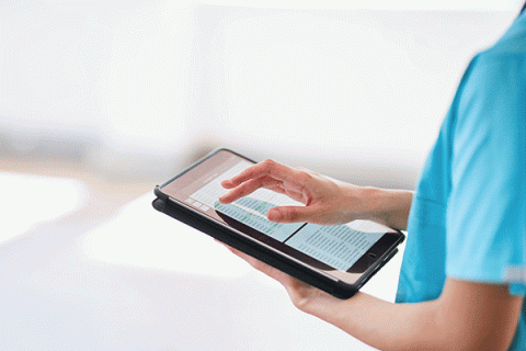 Shot of a doctor showing a patient some information on a digital tablet